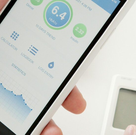 Glucose Monitor communicating with smartphone device.